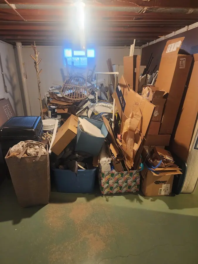 Roll-off dumpster container at job site for Yard Waste Dumpster Rental in Denham Springs